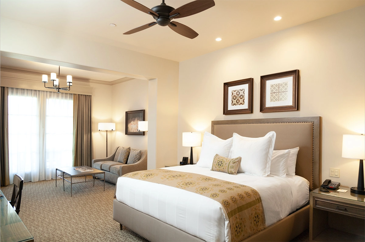 king junior suite with chairs and balcony