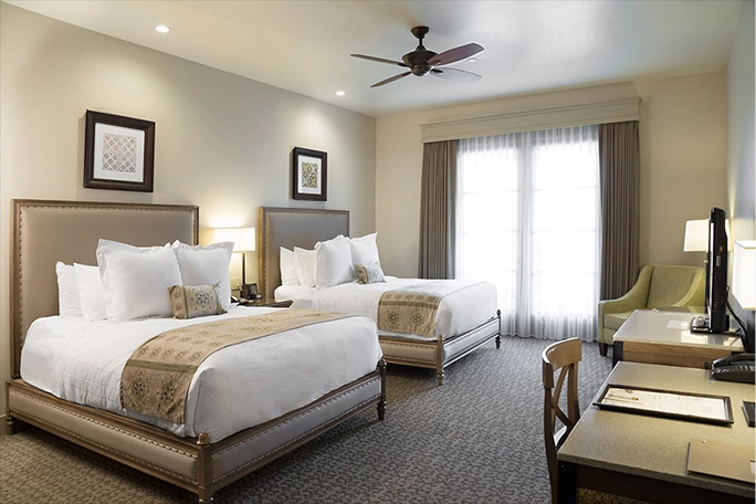 double queen room with chair